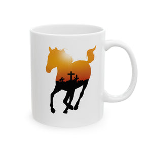 
                  
                    Load image into Gallery viewer, Mockup of a coffee mug featuring the silhouette of a running horse with an orange sky and crow outline in it
                  
                